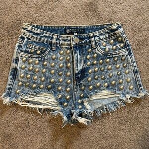 Jean shorts with metal detailing